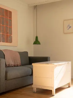 a living room with a couch and a coffee table at Le Loft par Maison Dudley in Lac-Mégantic
