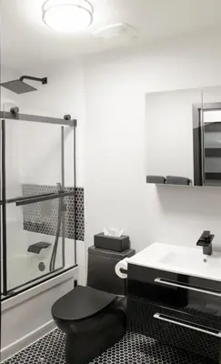 a bathroom with a shower and a sink at Chic 1-Bedroom Retreat in Montreal's Vibrant Plateau Mont-Royal Area - Apt 3 in Montréal
