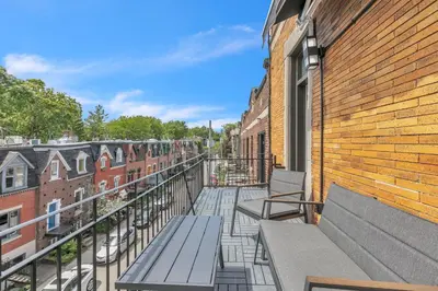 a balcony with benches on a building at Eat, Explore & Enjoy Downtown Montreal at this Sleek City Escape located in Plateau Mont-Royal - Apt 4 in Montréal