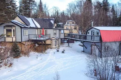 an aerial view of a house in the snow at Chalet BIA - Le Petit Chaleureux in Ham Nord