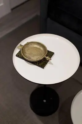 a white table with a plate on top of it at 6768 - 102 Cozy and Fresh Mini Studio with kitchen by Denstays in Montréal