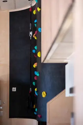 a room with a wall with colorful balls on the wall at Cottage Zoobox-style 51 in Eastman