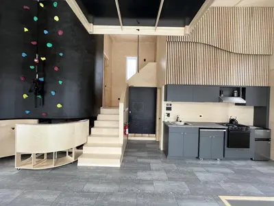 a kitchen with a staircase and a kitchenasteryasteryasteryasteryasteryasteryasteryastery at Cabin Zoobox 63 in Eastman