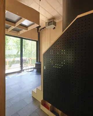 a room with a staircase and a large window at Cabin Zoobox 75 in Eastman