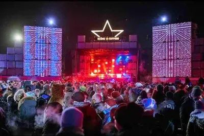 a large crowd of people standing in front of a stage at Cozy 1BR in Vieux-Longueuil +parking 14min Downtown in Longueuil