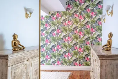 a room with a wallpaper with pink flowers at Exclusive 6 bed, 6 bath residence in Old Montreal in Montréal