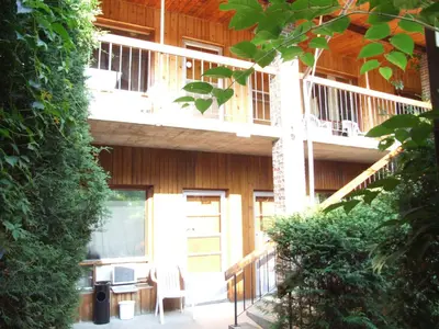 an outside view of a building with a balcony at Motel Lennoxville in Sherbrooke