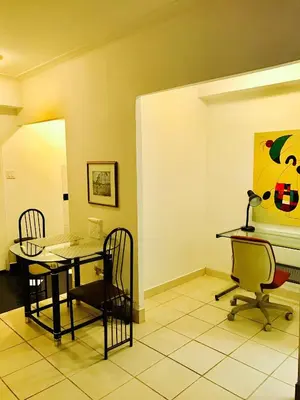 a dining room with a table and chairs at Stylish Montreal Apartment: Comfortable Stay in the Golden Square Mile in Montréal