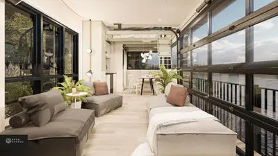 a balcony of a house with couches and windows at MiniBora Le lichen - Cantons-de-l'Est in Bury