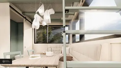 a dining room with a table and a window at MiniBora Le marin - Cantons-de-l'Est in Bury