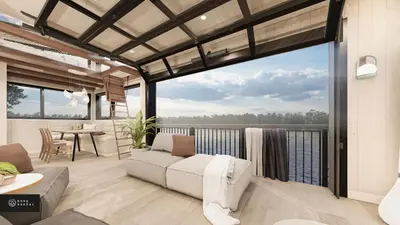 a living room with a couch and a balcony at MiniBora Le moka - Cantons-de-l'Est in Bury