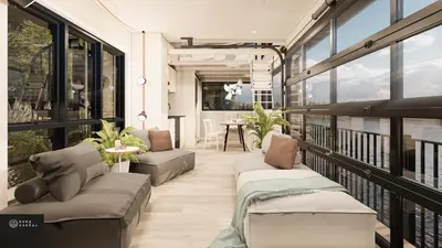 a balcony with couches and a table and windows at MiniBora Le cumulus - Cantons-de-l'Est in Bury