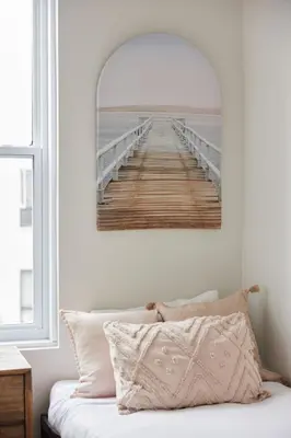 a bedroom with a bed and a boardwalk in a room at New and Cozy 3 bedroom in Le Plateau by Denstays in Montréal