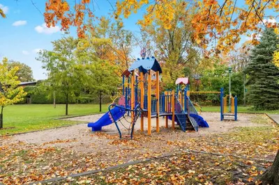 a playground with a slide in a park at Spacious Urban Cabin in West Montreal - 4BR in Montréal