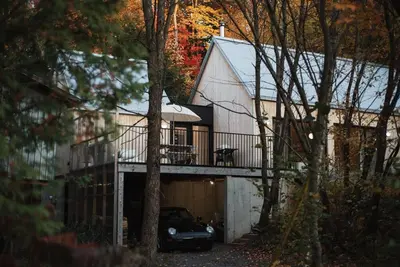 a car parked in front of a house at Chez Pedro in Saint-Valère