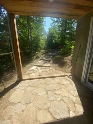 an open door to a screened in porch at chalet Ani in Piopolis