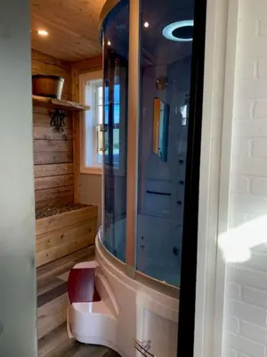 a bathroom with a shower in a house at Gîte des étoiles in Notre-Dame-Des-Bois
