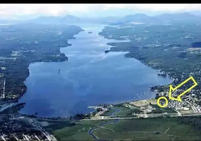 an aerial view of a large body of water at Condo Phoenix prés du Lac Memphrémagog. in Magog-Orford