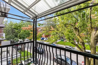 a balcony with a view of a street at Charming 1 BR Apartment cozy and fully equipped in Montréal