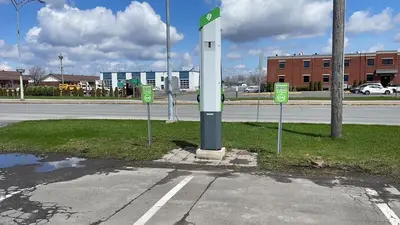 a gas station on the side of a street at Travelodge by Wyndham Drummondville in Drummondville