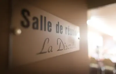a sign on a wall that reads sale do better la dance at Travelodge by Wyndham Drummondville in Drummondville