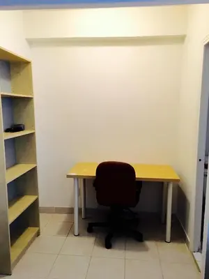a chair sitting at a desk in a room at Stylish Montreal Apartment: Comfortable Stay in the Golden Square Mile in Montréal