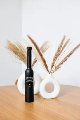 a bottle of wine sitting on a table with eggs at Le Mile End by M11 - Luxury 1BDR Loft with Sofa Bed in Montréal