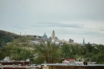 a view of a city with buildings in the background at New Spacious and Cozy 2bdr Apartment in Montréal