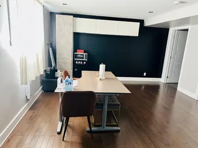 a dining room with a table and two chairs at Urban Retreat - 2 Bedroom, 3 Beds, 6 Guests, Free Parking in Longueuil