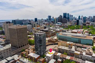 an aerial view of a city with tall buildings at City Center King Suite in Montréal