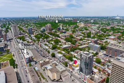 an aerial view of a city with tall buildings at City Center 2BR Condo in Montréal