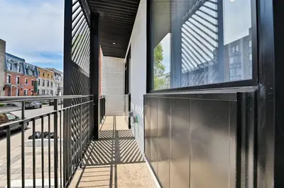 an external view of a building with a balcony at 2BR Downtown Suite with Balcony in Montréal