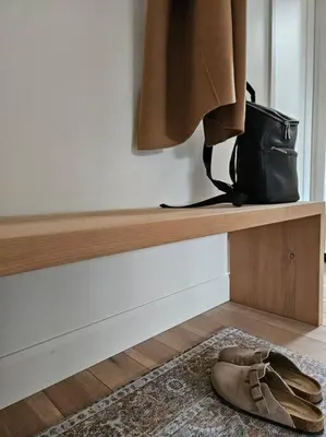 a pair of shoes sitting on a shelf with a purse at Chalet Le Hygge Hytte - Ski - Golf - Spa in Thetford Mines