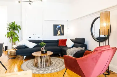 a living room with a couch and a table at Appartement au coeur de Villeray in Montréal