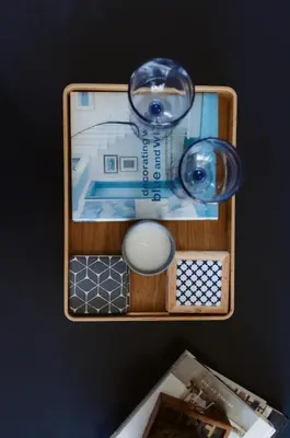 a wooden shelf with two glass objects in it at Etoile bleue Beach bike shops Magog-Orford in Magog-Orford