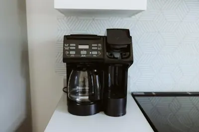 a coffee maker in a shelf in a refrigerator at Etoile bleue Beach bike shops Magog-Orford in Magog-Orford