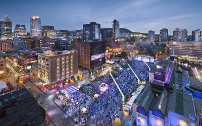 an overhead view of a crowd of people at a street festival at Sky Bridge Spectacular in Montréal