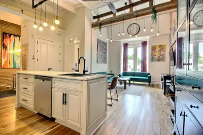 a kitchen with a sink and a counter top at Galeria St Denis in Prime Montreal in Montréal
