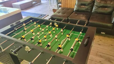 a chess board with players on it in a living room at Spa Nature Estrie in Saint-Herménégilde