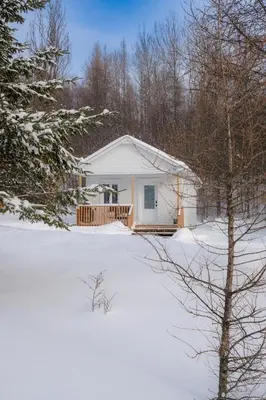 a house with snow in front of it at Chalet 2 OST Shefford in Shefford