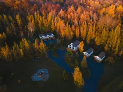 an aerial view of a house in a forest at Chalet 3 OST Shefford in Shefford