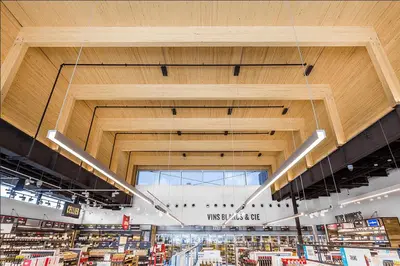 a view of a store with a large wooden ceiling at Stylish 1-Bedroom Haven by Jean Talon Market in Montréal
