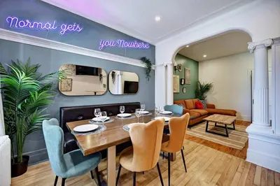 a dining room with a table and chairs at MTLVacationRentals- Le Clebard in Montréal