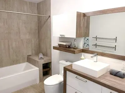 a bathroom with a sink and a tub and a toilet at Archimede Panorama Spa in Austin