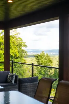 a room with a large window with a view at Archimede Panorama Spa in Austin