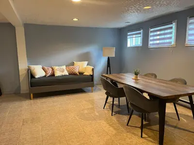 a living room with a couch and a table at Zen Space in perfect location! in Montréal
