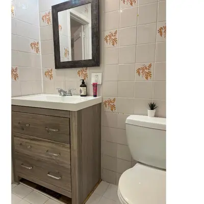 a bathroom with a sink and a toilet at Zen Space in perfect location! in Montréal