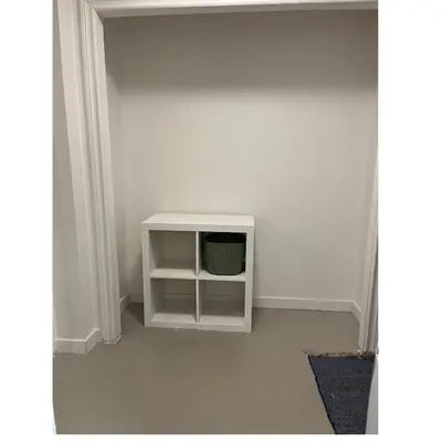 a room with a small white table in the corner at Zen Space in perfect location! in Montréal