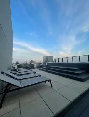 a group of benches on the roof of a building at Panoramic Apartment in the old port in Montréal