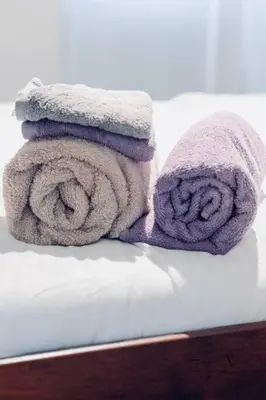 a pair of towels sitting on top of a table at Charming 2 BD condo griffintown in Montréal